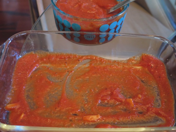 A little sauce on the bottom of your casserole/baking dish.